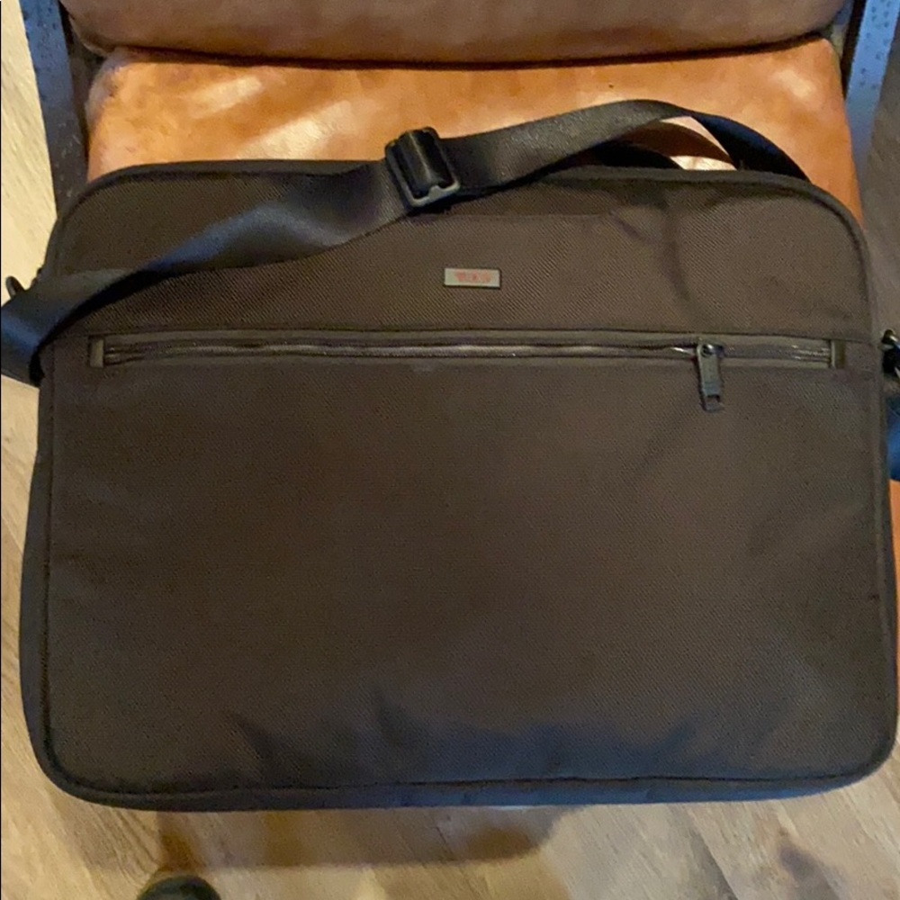 Tumi laptop messenger bag, new.